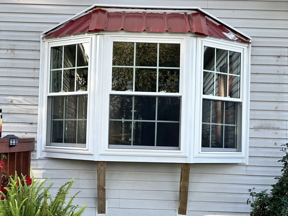 Slide of All American Exteriors