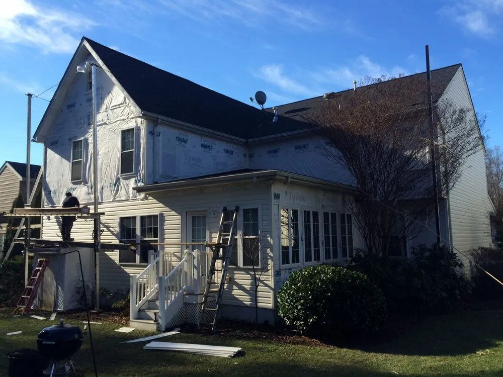 Slide of All American Home Improvement