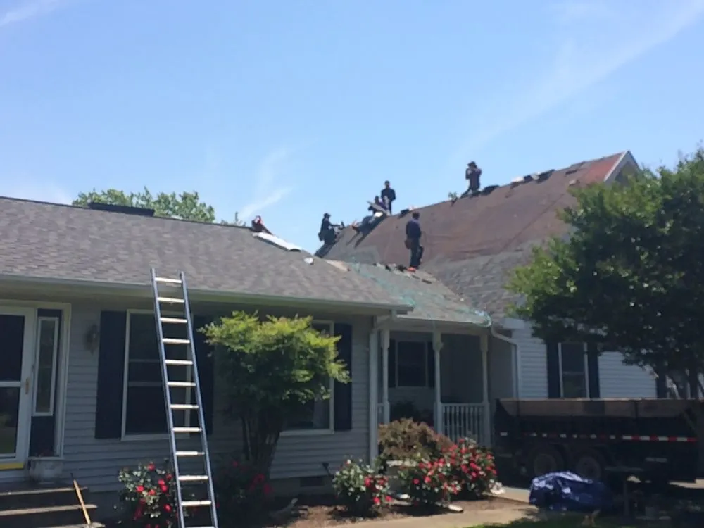 Slide of All American Home Improvement