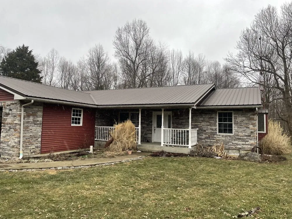 Slide of All American post buildings and contracting