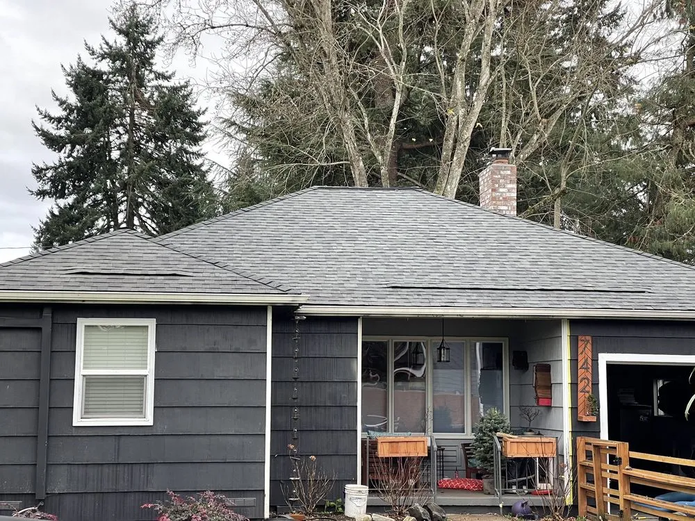 Slide of All American Roofing & Building