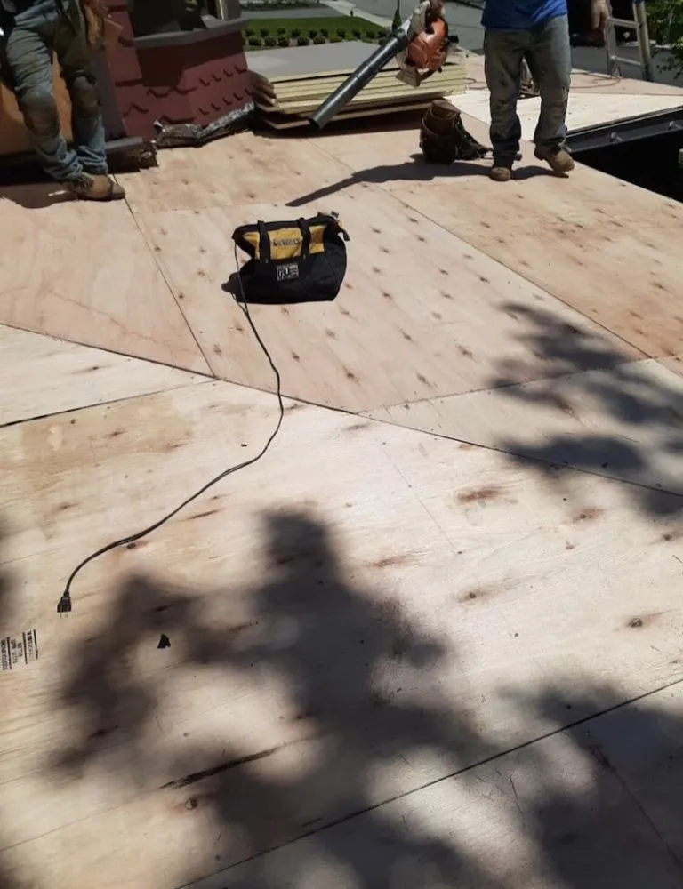 Slide of All American Roofing & Construction