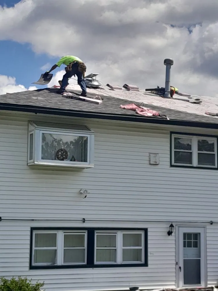 Slide of All American Roofing & Construction