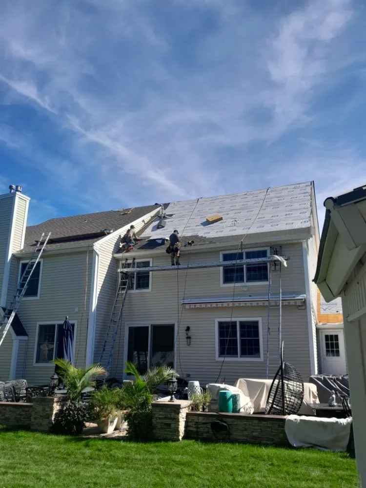 Slide of All American Roofing & Construction