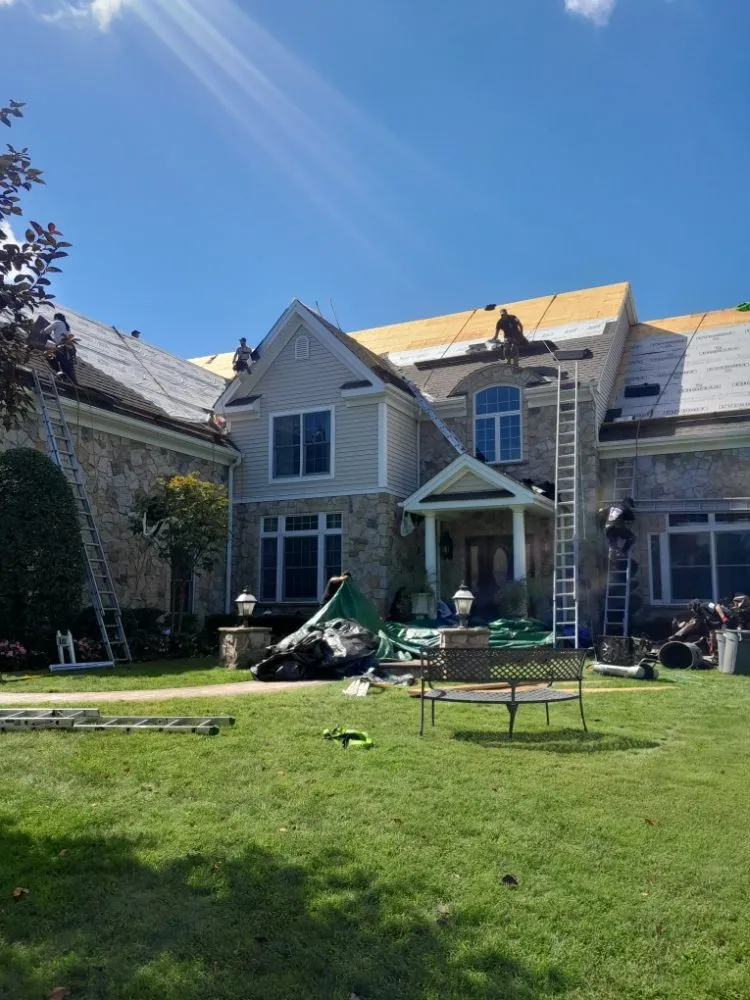 Slide of All American Roofing & Construction