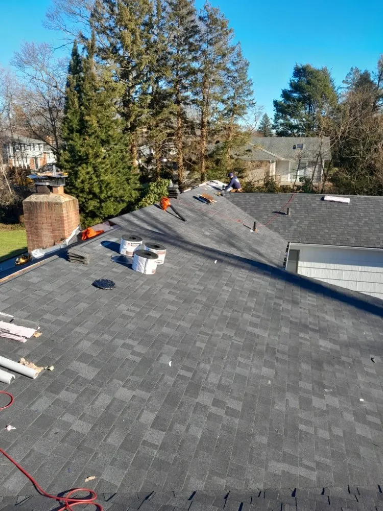 Slide of All American Roofing & Construction