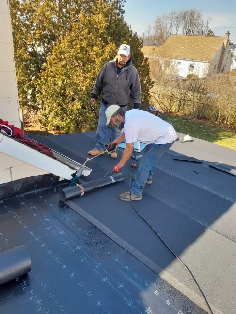 Slide of All American Roofing & Construction