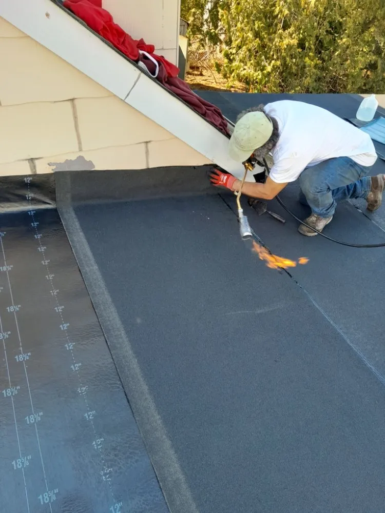 Slide of All American Roofing & Construction