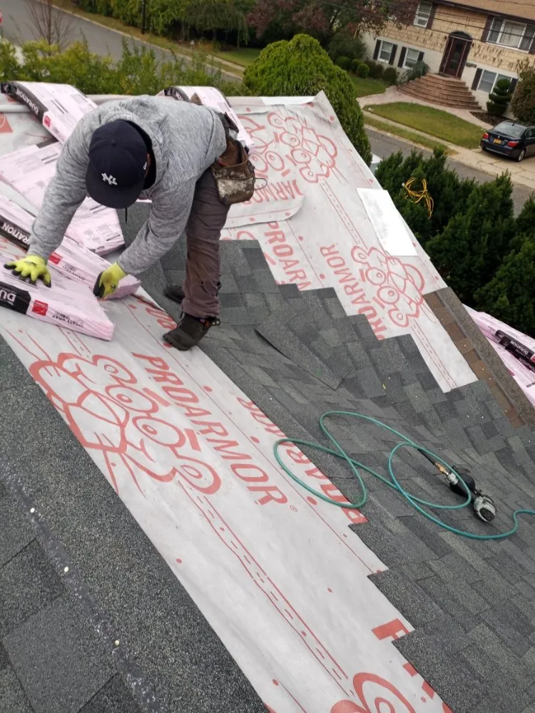 Slide of All American Roofing & Construction