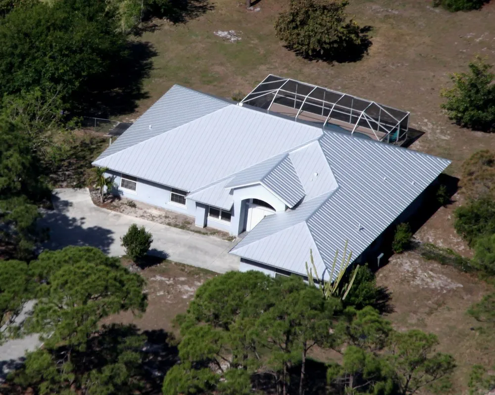 Slide of All American Roofing And Coating Of Florida