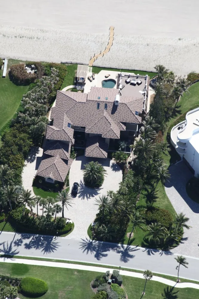 Slide of All American Roofing And Coating Of Florida