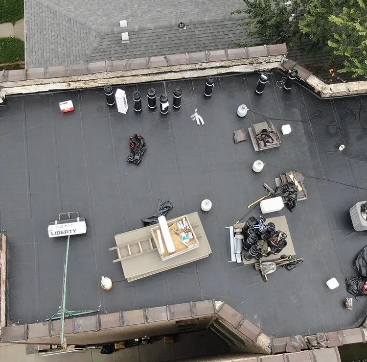 Slide of All American Roofing and Masonry