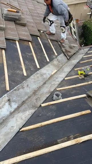 Slide of All American Roofing and Seamless Gutters