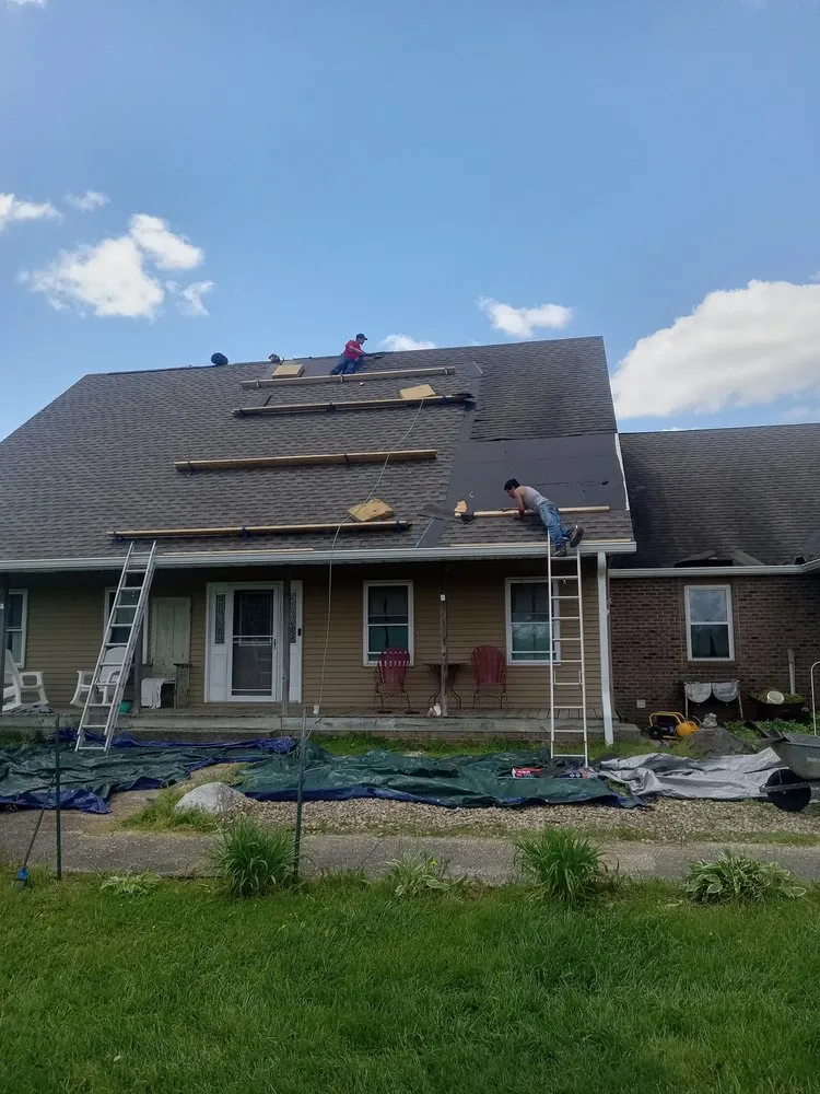 Slide of All American Roofing