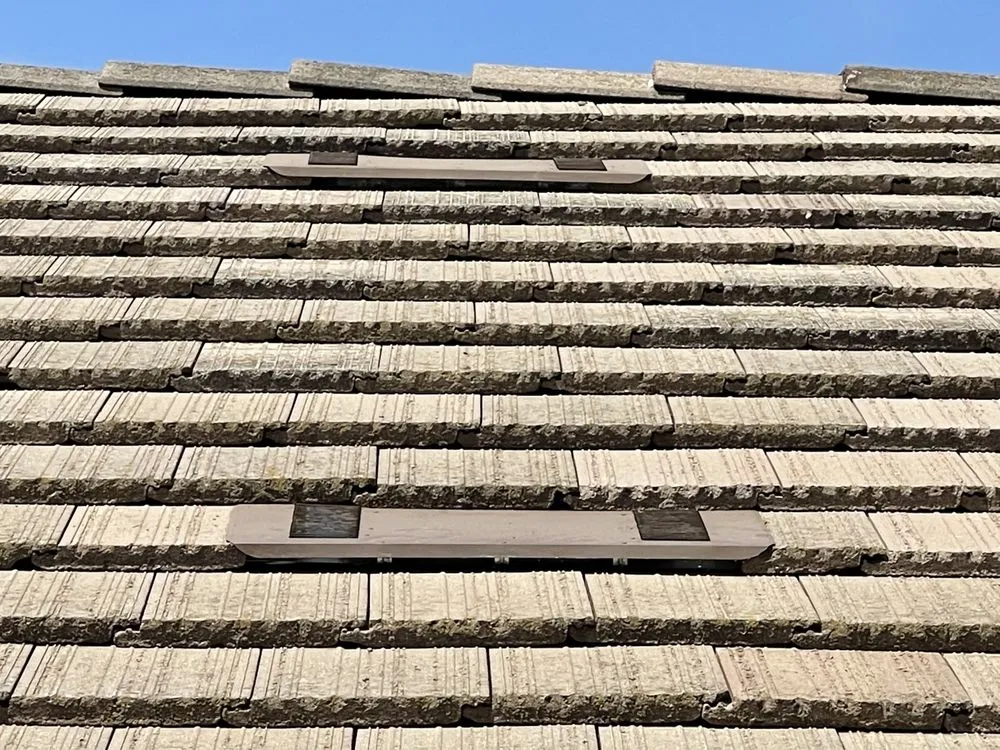 Slide of All American Roofing