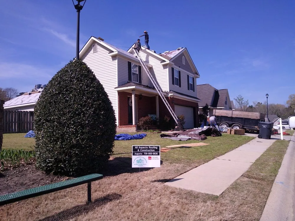 Slide of All Aspects Roofing and Construction