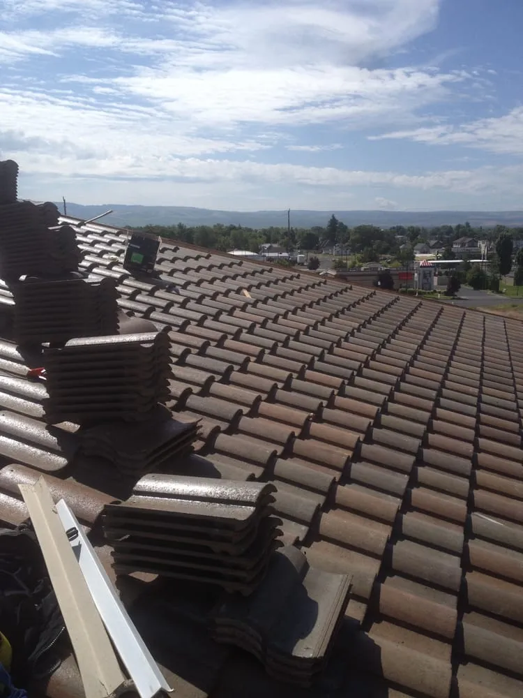 Slide of All City Roofing