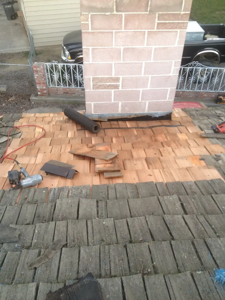 Slide of All City Roofing