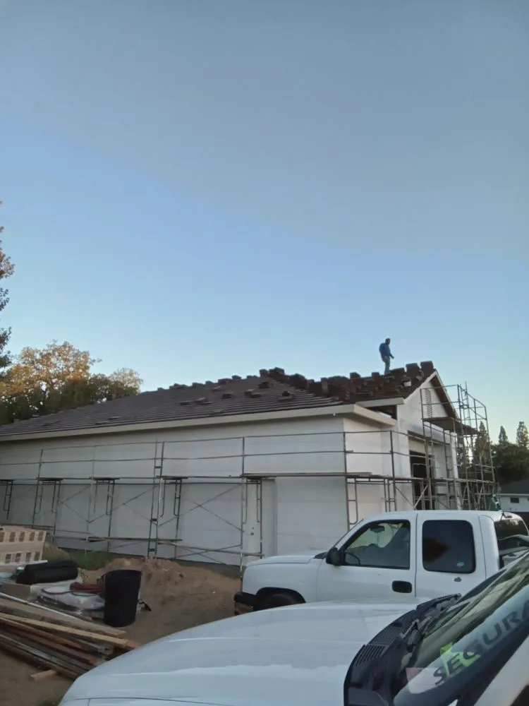 Slide of All Day Roofing