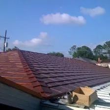 Slide of All In One Exterior & Construction