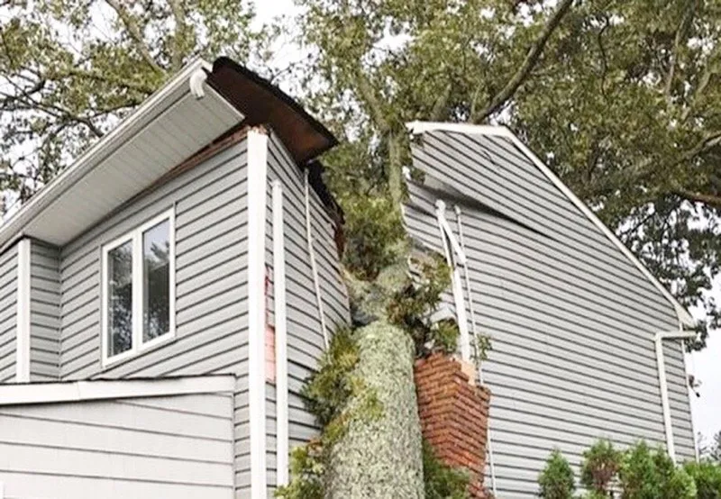 Trusted storm damage roof repair for homes in Ronkokoma, NY by All Island Restoration