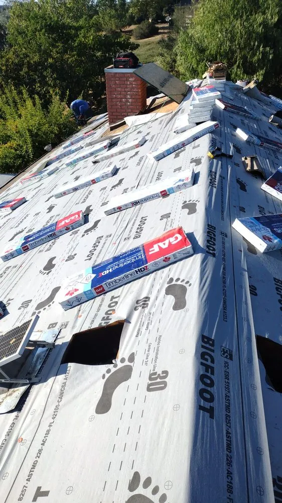 Slide of All out Roofing and Construction