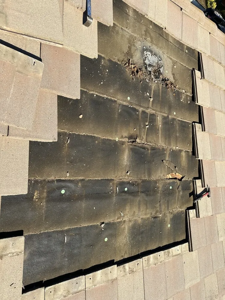 Slide of All out Roofing and Construction