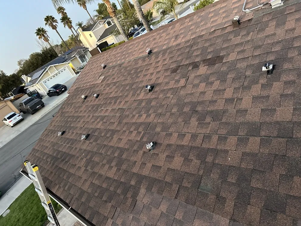 Slide of All out Roofing and Construction