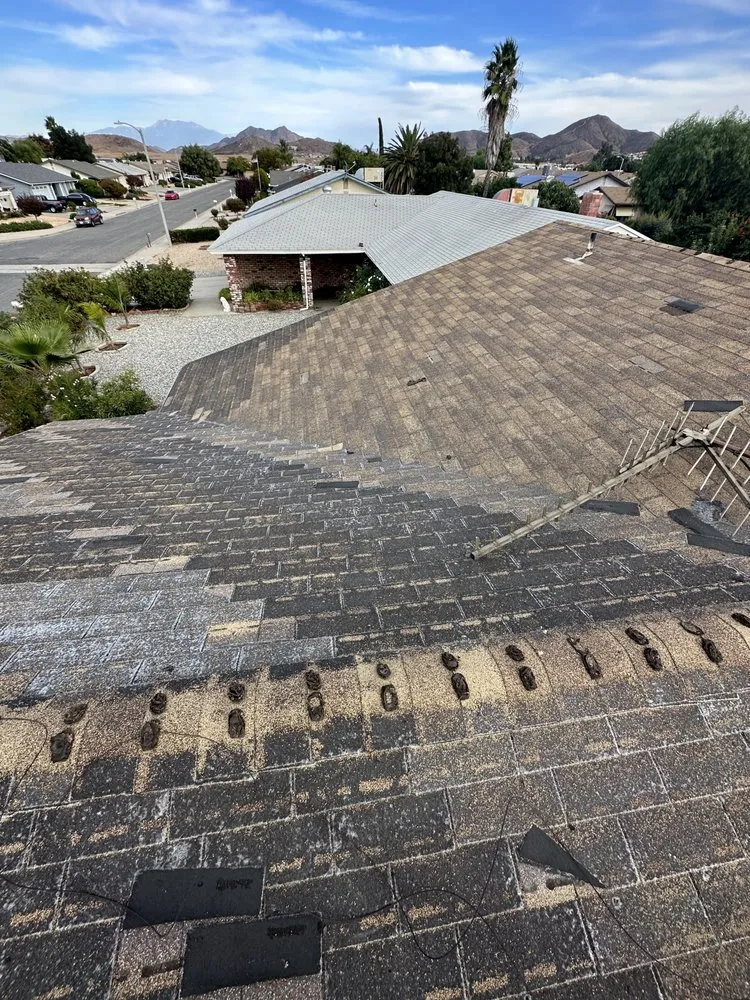 Slide of All out Roofing and Construction