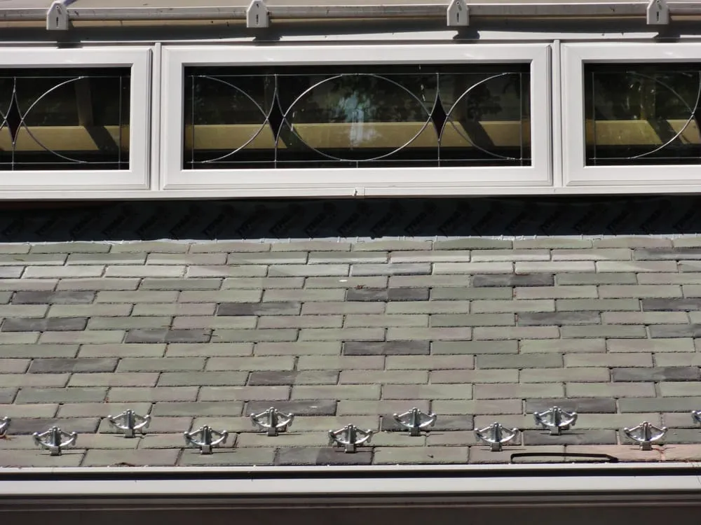 Slide of All Roofs R Us