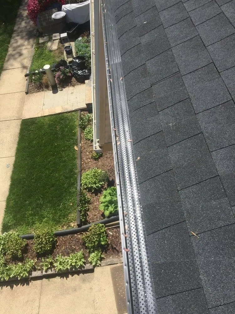 Slide of All Seasons Gutter & Roofing Services