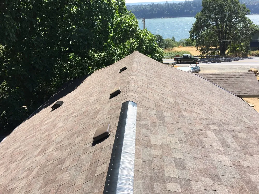 Slide of All Seasons Roofing & Painting