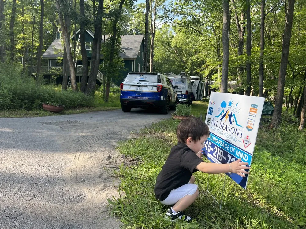 Slide of All Seasons Roofing & Siding