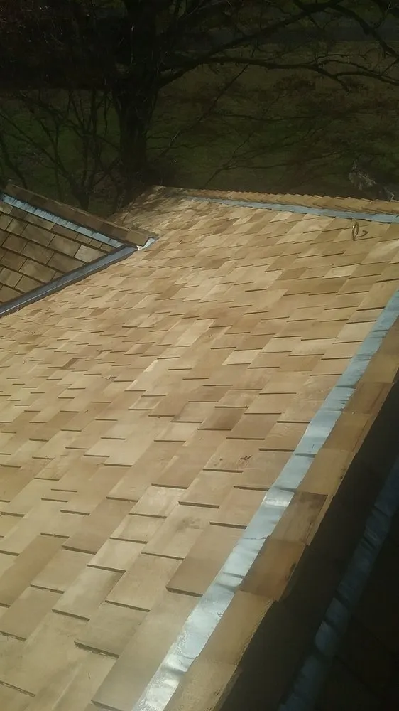 Slide of All Slope Roofing