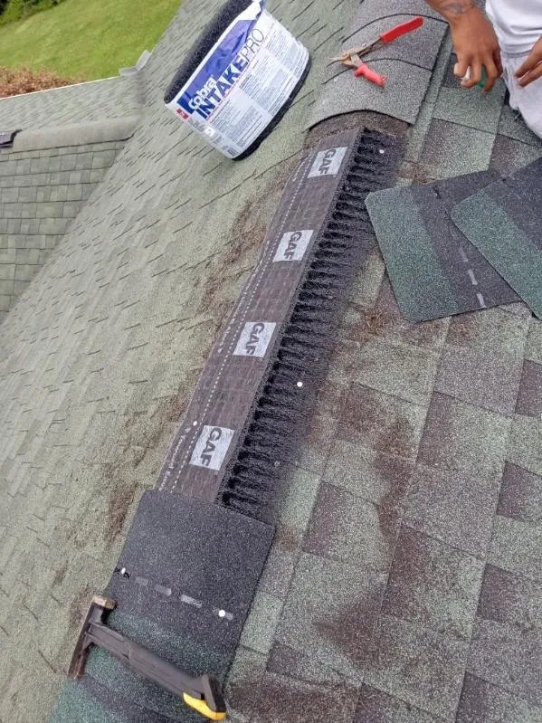 Slide of All Slopes Roofing