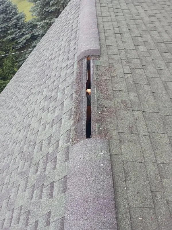 Slide of All Slopes Roofing