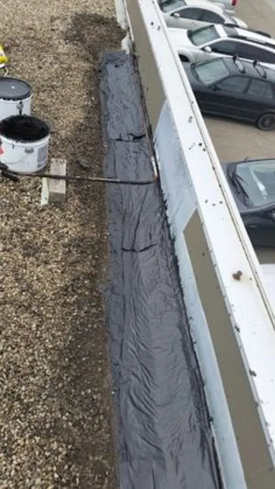 Slide of All Tar Roofing Contractors