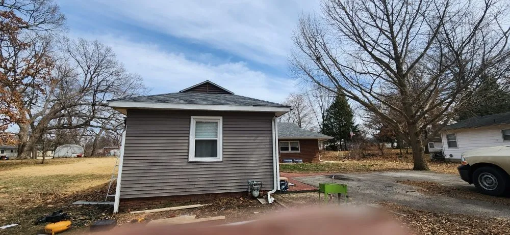 Slide of All Time Roofing and Construction