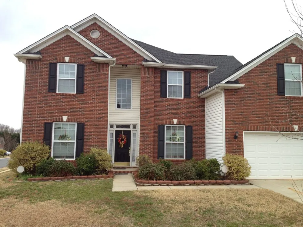 Slide of All-Tite Exteriors