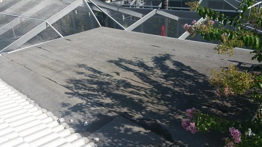 Slide of All Weather Insulated Roof Coating Services