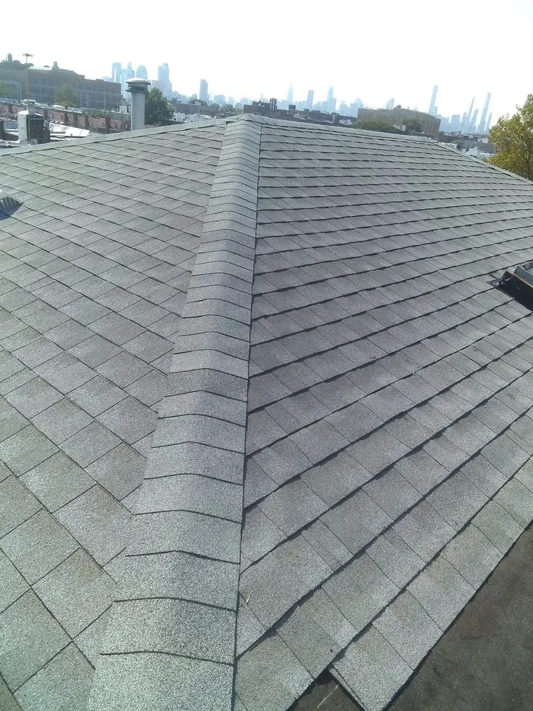 Top-rated shingle roofing service with free inspection across Woodside, NY - All Weather Roofing & Waterproofing