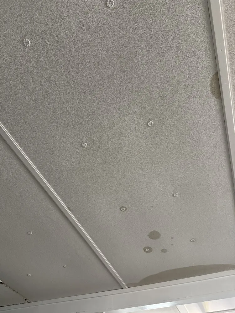 Slide of All Weather Roofing