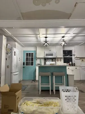 All Weather Roofing Logo