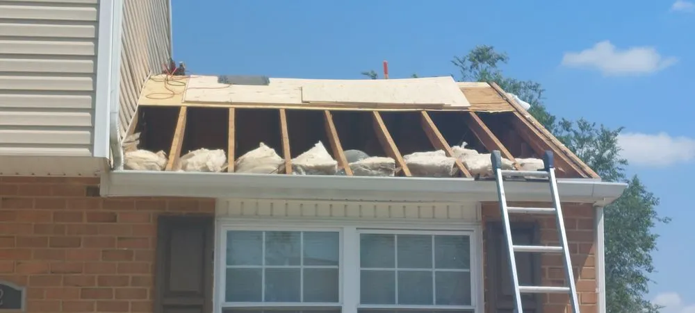 Slide of All Weather Roofing Company