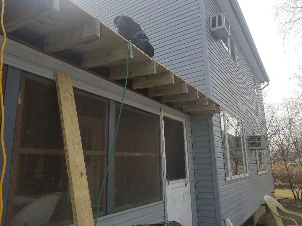 Slide of All Weather Roofing