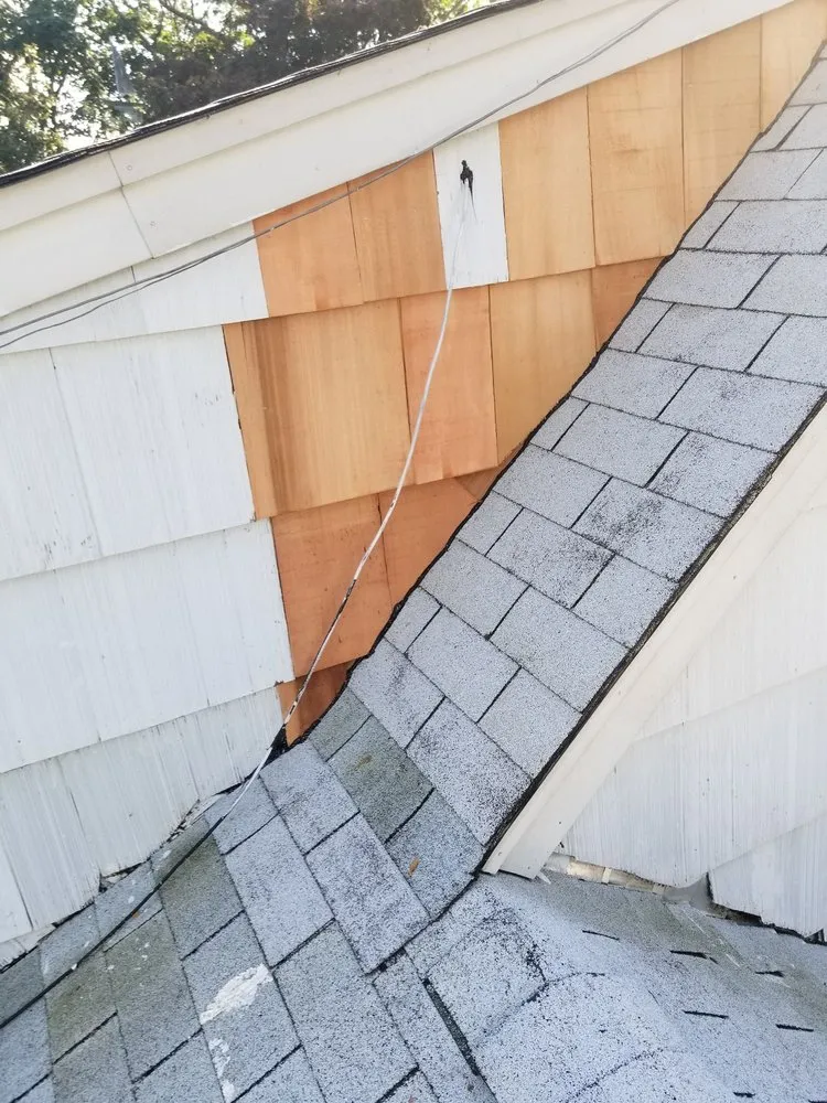 Slide of All Weather Roofing