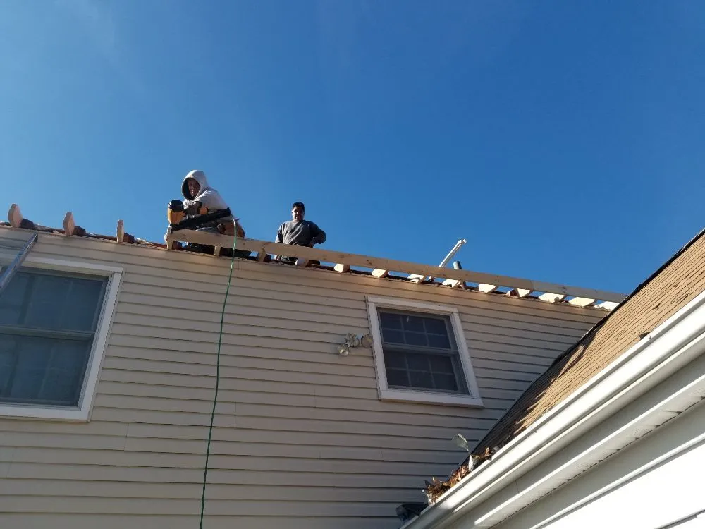 Slide of All Weather Roofing