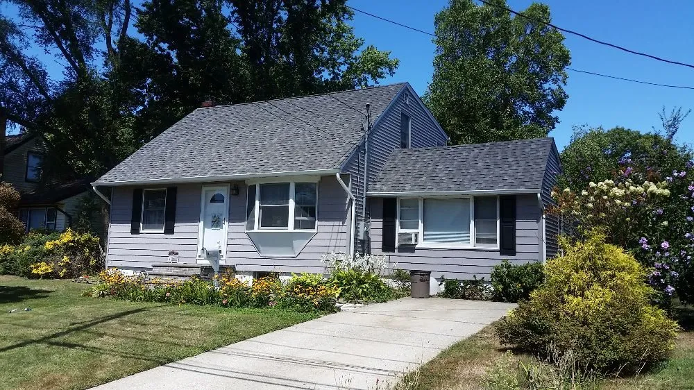 Slide of All Weather Roofing