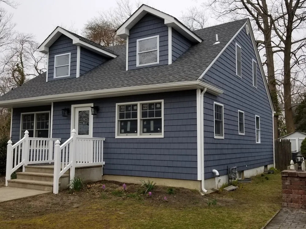 Slide of All Weather Roofing