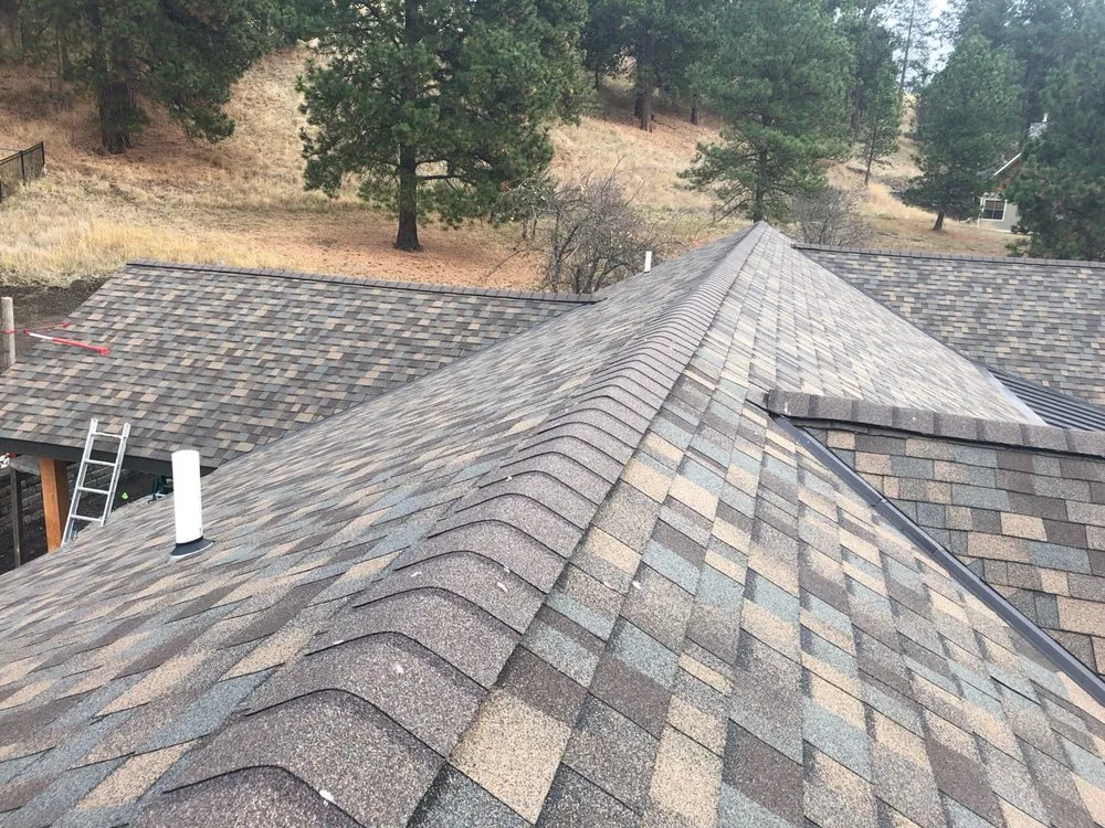 Slide of All-Weather Roofing